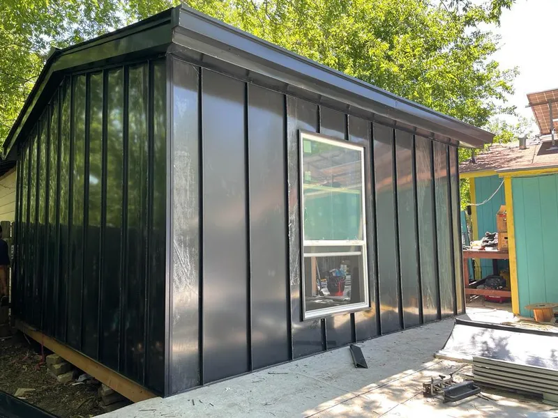 Black standing seam metal wall panels for Metal Roof Installation in Duvall