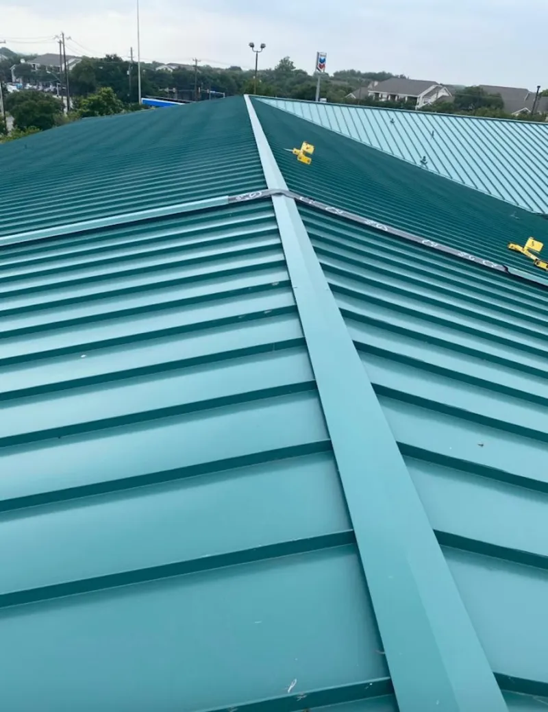 Green commercial metal roof ridge and valley for Metal Roof Repair in Duvall